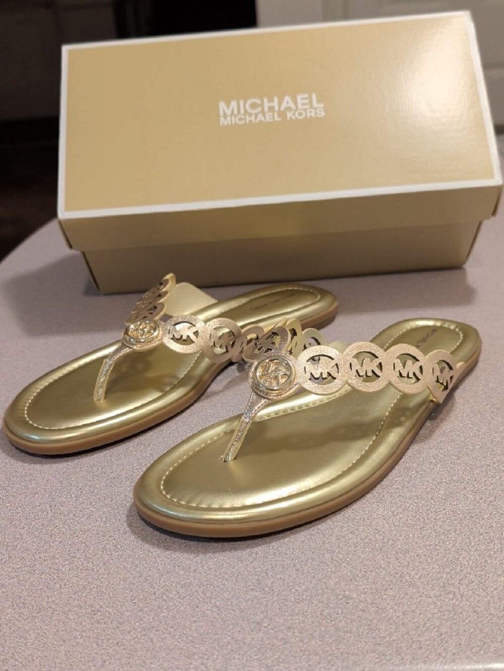MICHAEL Michael Kors Janie Metallic Flip Flop Thong Sandals Color: PALE GOLD NWT